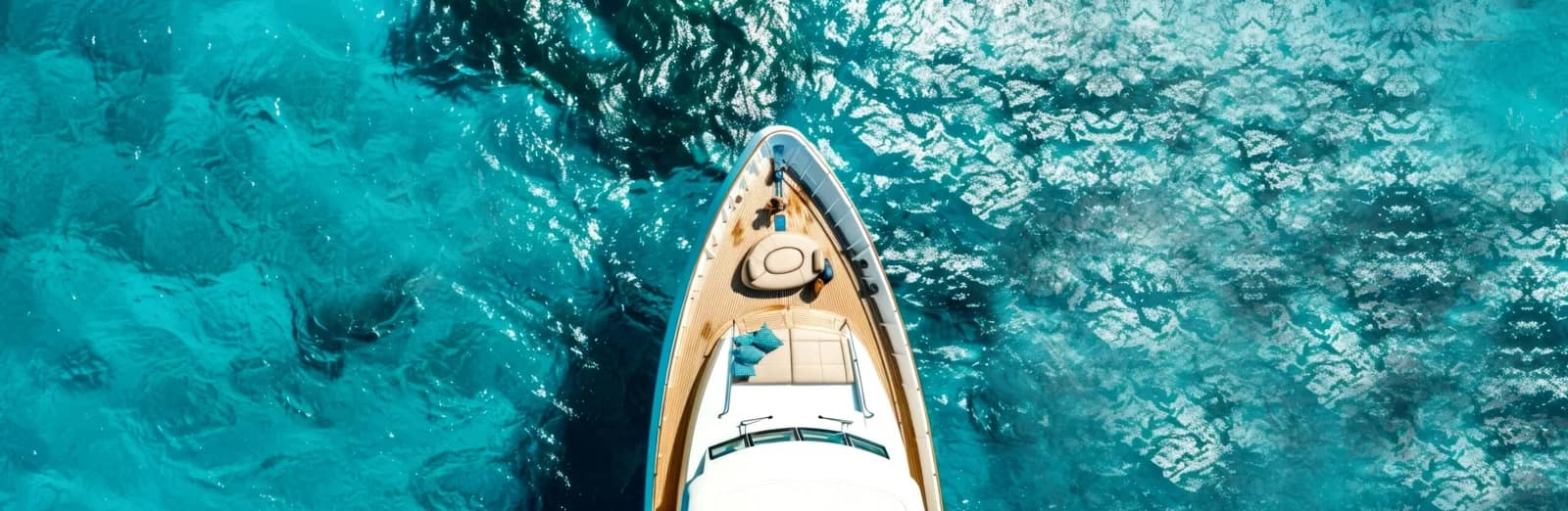 Luxury yacht near beach with turquoise waters